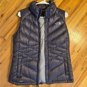 NORTH FACE puffer vest in purple color size M women’s.